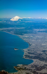 Aerial view of Mount Fuji with a snow cap and Enoshima Island Kanagawa,   Japan