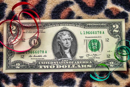 Third President of the United States Thomas Jefferson displayed on a Two Dollar Bill.