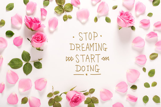 Stop Dreaming Start Doing message with roses and leaves top view flat lay