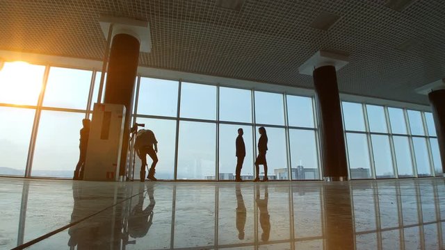 The shooting process with people in the office center. time lapse