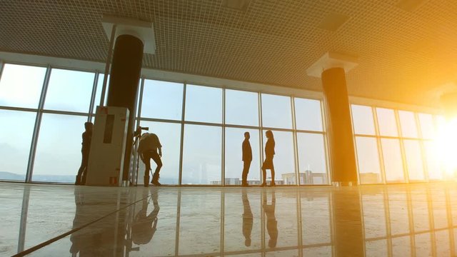 The shooting process with people in the office hall. time lapse