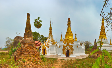 Fototapeta premium Sankar pagoda. Stupa on the foreground. Shan state. Myanmar. Panorama
