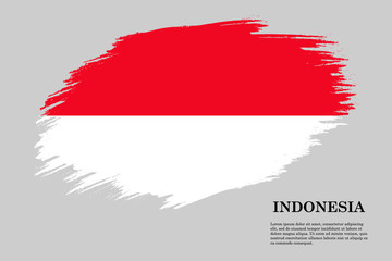 Grunge styled flag Indonesia. Brush stroke background