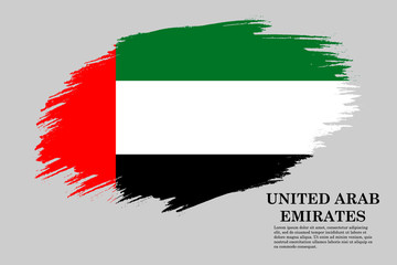 Grunge styled flag UAE. Brush stroke background