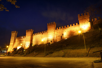 Night view of the medieval Gradara castle near Pesaro city, Marche, Italy.