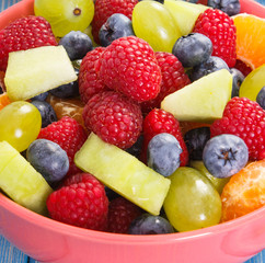 Fresh fruit salad in bowl, healthy nutrition concept