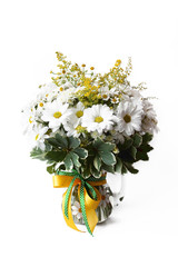 feminine simple bouquet consisting, mimosa, chamomile in vase on white background ,delicate, summer,isolated