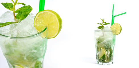 Fresh mojito cocktail with lime and mint on white background
