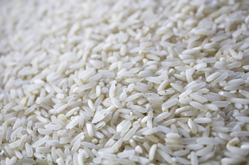 White rice; rice groats; rice grains background