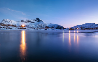 Mountain ridge and reflection in the lake. Natural landscape in the Norway
