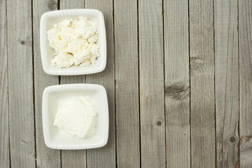 dairy products, rustic wooden table background