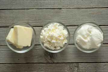 dairy products, rustic wooden table background