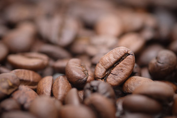 Close up - roasted coffee beans as a background composition, can be used as a background.