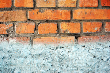 Gray old cement on the bricks wall, divide background on two parts, grunge texture background