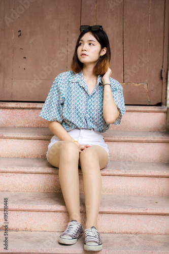 Portrait Of Thai Adult Beautiful Girl Short Hair Relax And Smile