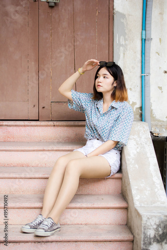 Portrait Of Thai Adult Beautiful Girl Short Hair Relax And Smile
