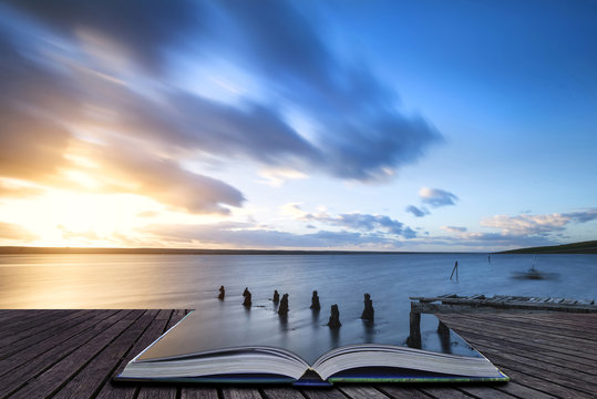 Creative book image of Beautiful vibrant sunset landscape image of Fleet Lagoon in Dorset England
