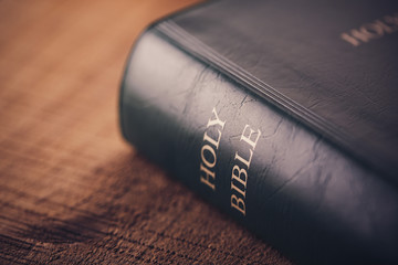 Holy Bible On Wooden Table