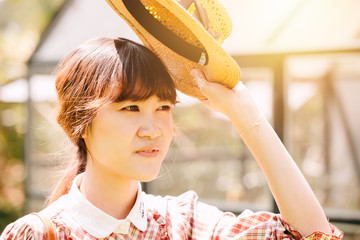 Asian women outdoor damage skin from exposure high UV sun concept