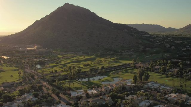Phoenix Arizona Aerial v13 Flying low over Phoenician Golf Club area panning sunset 9/16