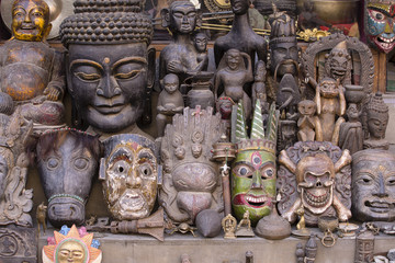 Souvenir wooden masks on nepalese street market in Kathmandu, Nepal