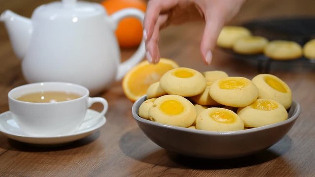 Cookies with orange marmalade. Put in a bowl orange cookies