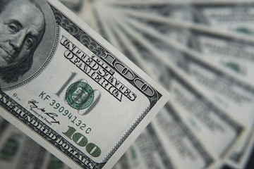 One hundred dollars pile. Money background, heap of dollars, financial concept of earnings. Top...