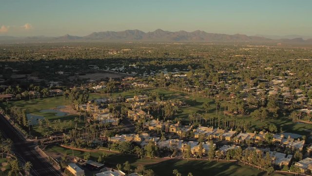 Phoenix Arizona Aerial v14 Flying low over Phoenician Golf Club area panning sunset 9/16