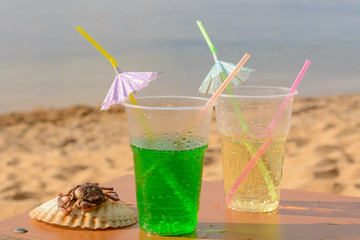 Drink and apple. Morning by the sea