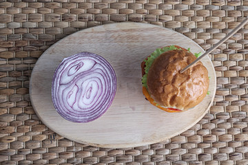 A vegetarian burger and onion.