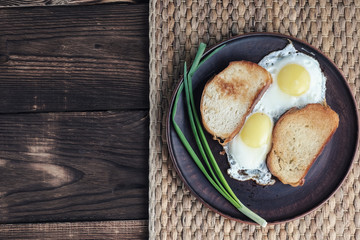 A scrambled eggs on a plate.