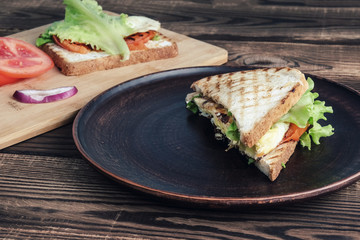 Sandwiches on the plates.