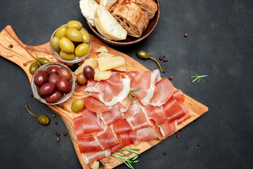 Italian prosciutto crudo or spanish jamon. Raw ham on white background.