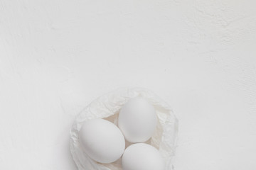 Easter background White eggs bowl