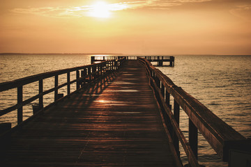 Fototapeta na wymiar Sunrise over pier.
