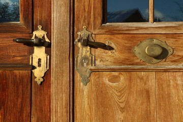 Old wooden door with antique fittings, alte Holztür mit antiken Beschlägen