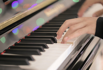 Fototapeta premium Playing Piano Close-up Shot