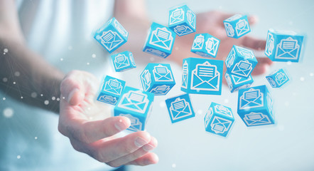 Businessman using floating cube emails 3D rendering