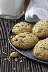 biscuits with milk on a wooden background