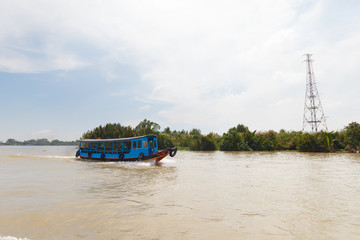 Fototapeta na wymiar tourist boat on mekong delta