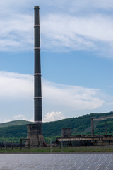 Power plant and solar panels in the middle of a field in Transylvania, Romania.