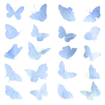 Abstract collection of butterfly silhouettes in watercolor.