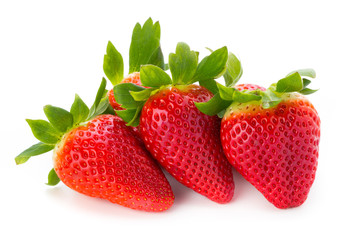 Fresh strawberries close up on white background.