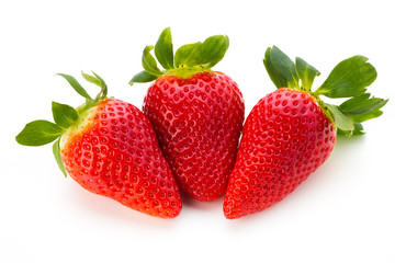 Fresh strawberries close up on white background.