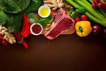 Culinary background with fresh vegetables and meat
