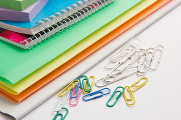 pencils paperclip notebooks notebooks on office desk