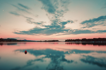 Sunset over the boat harbor. Boat harbor at sunset, peninsula Kassandra, Halkidiki, Greece.
