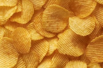 background corrugated golden chips with texture