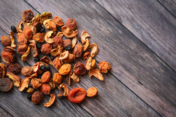 dried fruits on a wooden background, flat lay, berries, compote, a healthy lifestyle, vitamins