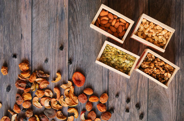 dried fruits on a wooden background, flat lay, berries, compote, a healthy lifestyle, vitamins